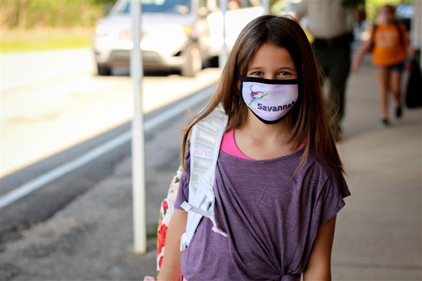 student smiles on first day of school